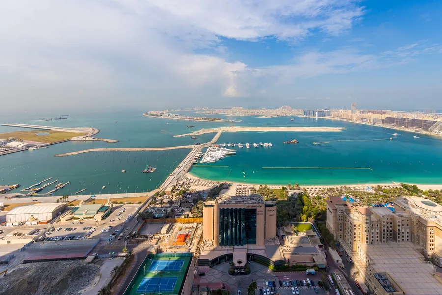 Sea and Palm Jumeirah seen from Dubai Marina